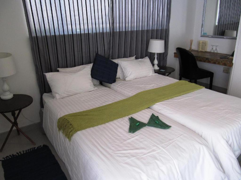 Tweepersoonskamer met 2 Aparte Bedden